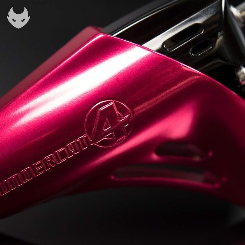 Macro of the embossed circled 4 on the magenta machine body